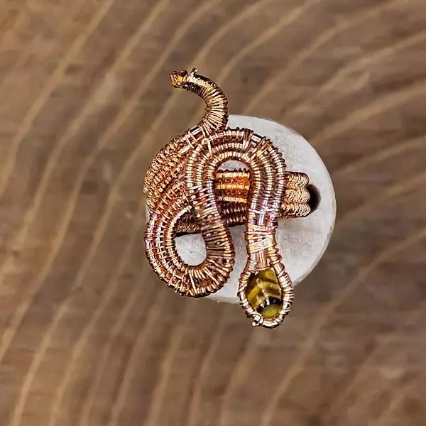 Anello serpente con occhio di tigre