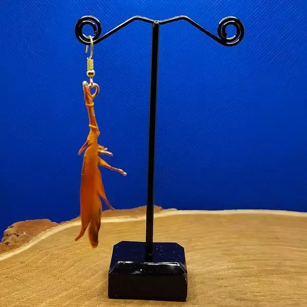 Mono orecchino piuma