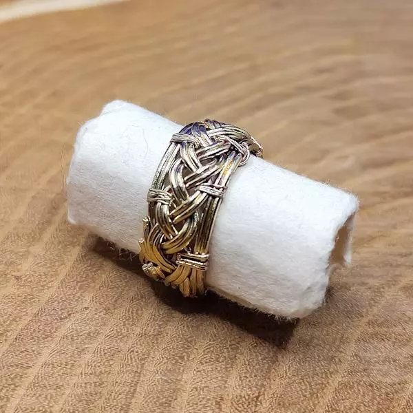 Anello da uomo in rame intreccaito