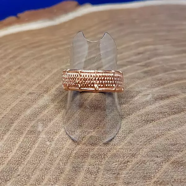 Anello da uomo in rame intrecciato