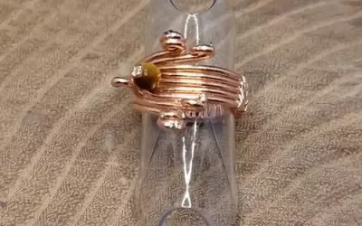 Anello in rame con occhio di tigre